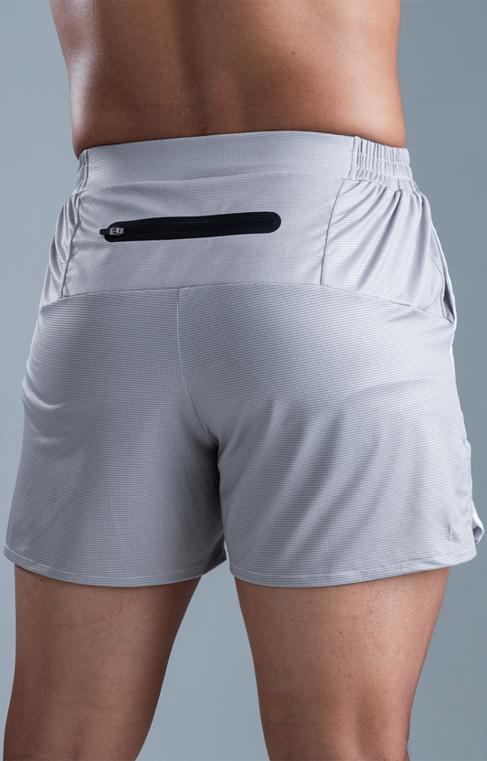 PANTALONETA RUNNING VIVE MARFIL MAN